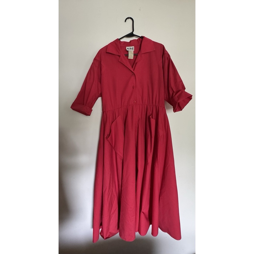 Red vintage 70s cotton midi dress with pockets and button up front. Size: 10